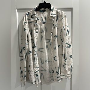 Women’s white blouse with turquoise squash blossoms